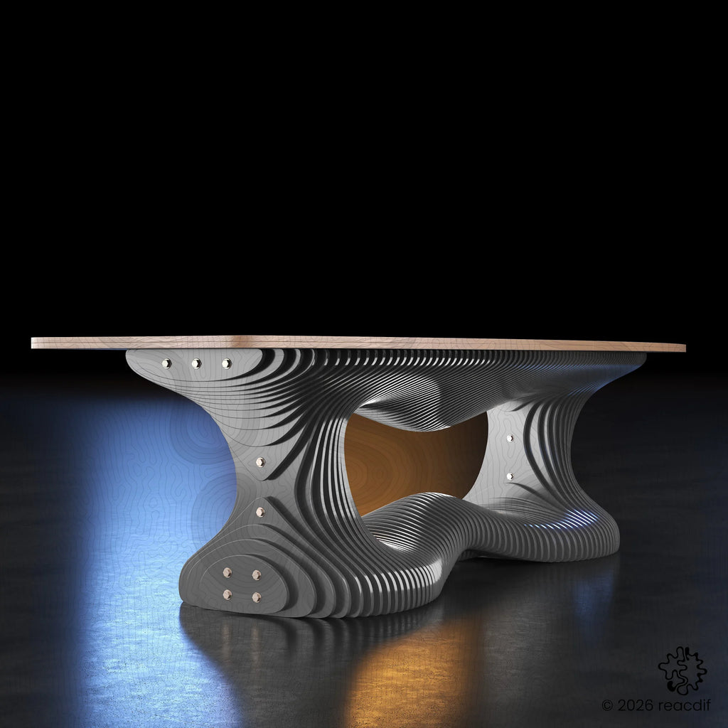 A full perspective view of the sculptural dining table shows its massive, waving wooden base supporting a flat top. The design features a layered plywood construction that mimics the flow of a river, making it a suitable centerpiece for large dining rooms or executive office spaces.